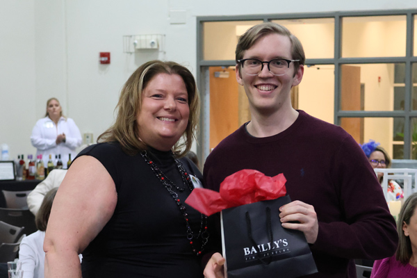 Camp director with winner of the bailey's giveaway